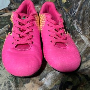 Girls hot pink and yellow lotto cleats size 2